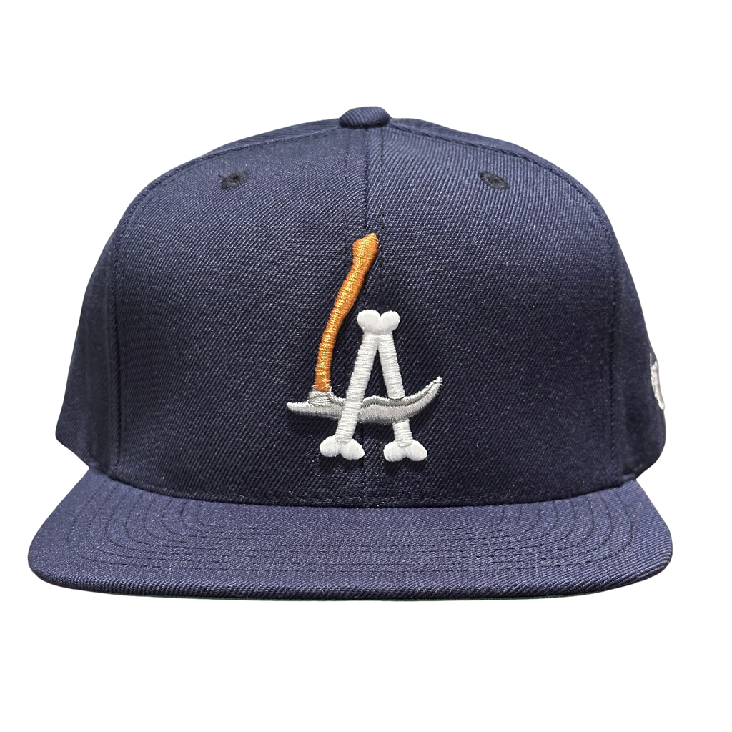 LA Scythe Snapback cap in navy.