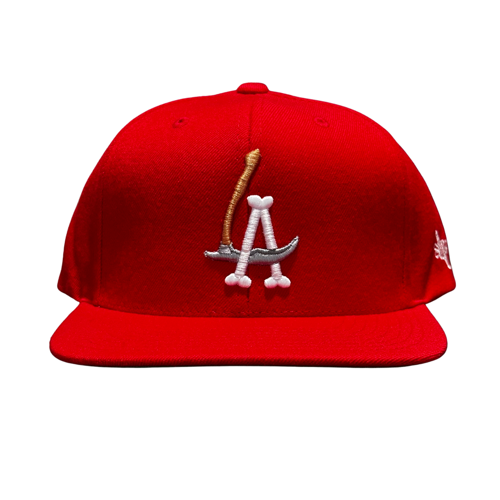 LA Scythe Snapback cap in red.