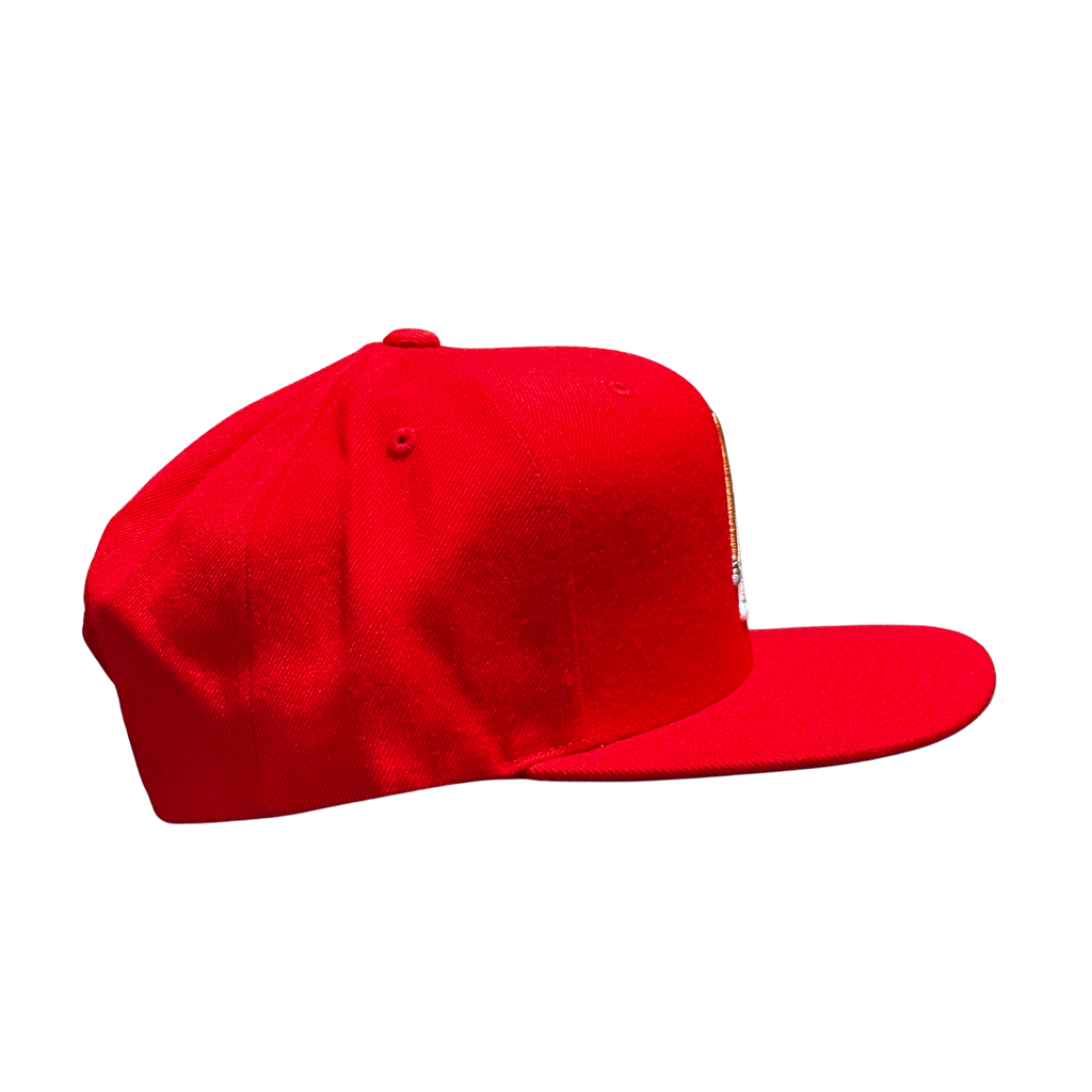 LA Scythe Snapback cap in red.
